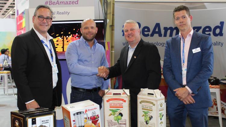Martin Shipp, Chief Operating Officer of The Delta Group (centre left) at FESPA Global 2018 with EFI's Ken Hanulec (centre right), Frank Mallozzi (far left) and Frank Janssen (far right).