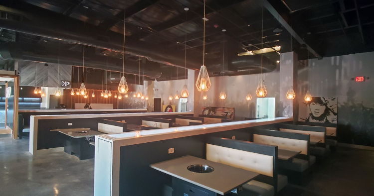 A branch of KPOP, a Korean barbecue restaurant, has a stylish new look thanks to over 6,200 sq. ft of wall graphics printed on Drytac ReTac by High Stakes Creative.