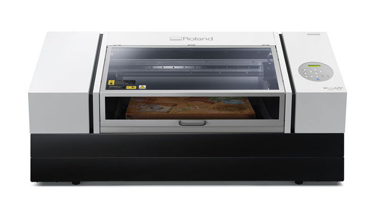 Roland DGA introduces new VersaUV LEF2-300D flatbed UV printer.