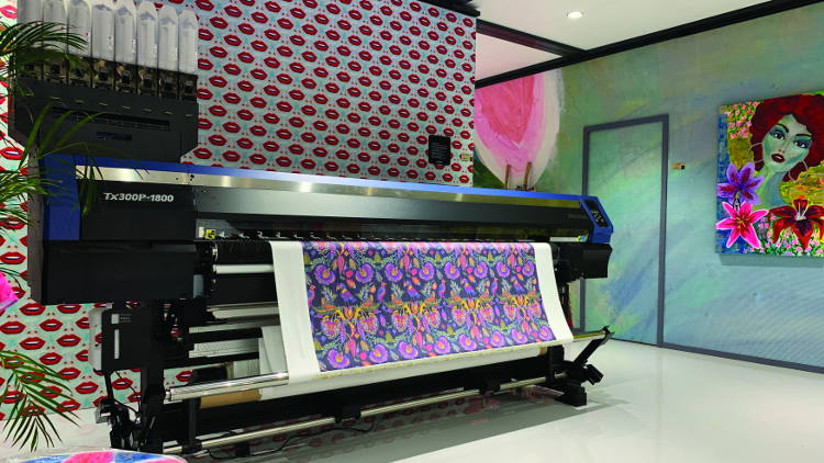 Mimaki hybrid printer demonstration at ITMA 2019 emphasises accessibility of textile printing.